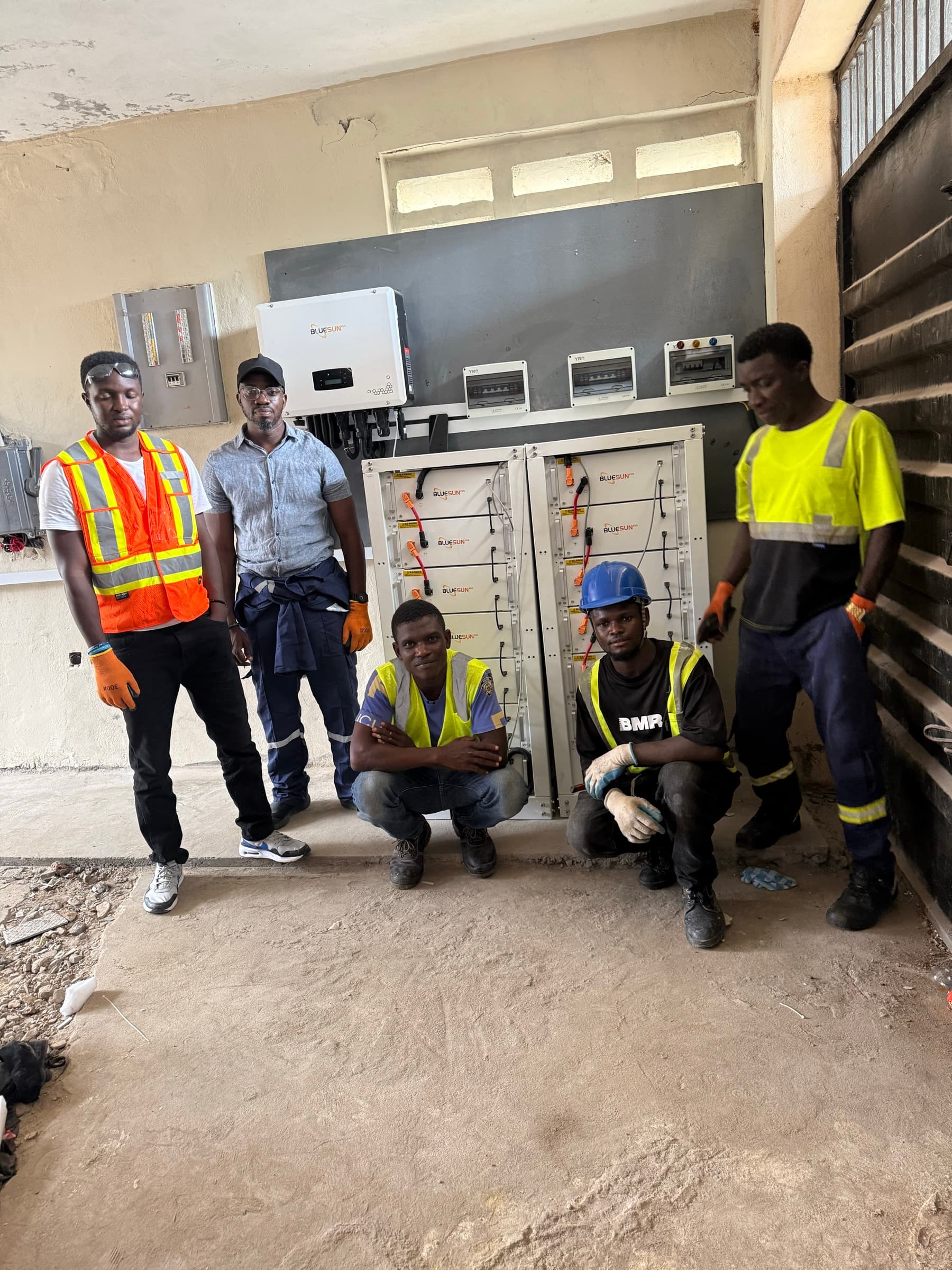 PKS field team with inverter and battery storage installation in Sierra Leone