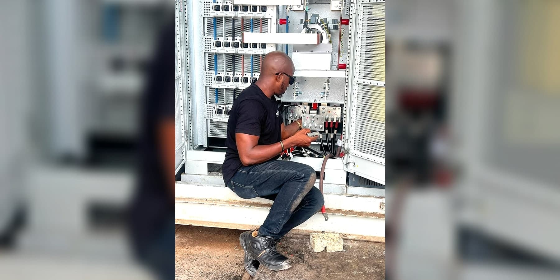 PKS technician working on electrical control equipment